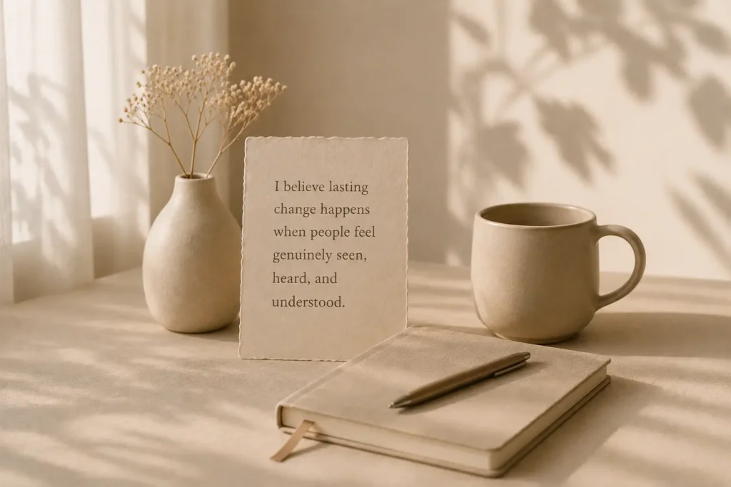 A notebook and a note about lasting change on a table.